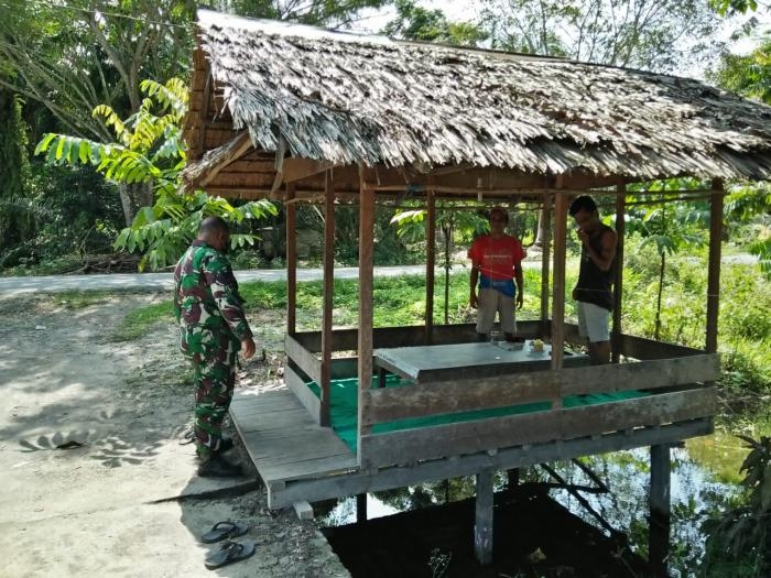 Putus Covid 19, Serma Syafri Giat Lakukan Operasi Yustisi di Desa Buatan Lestari