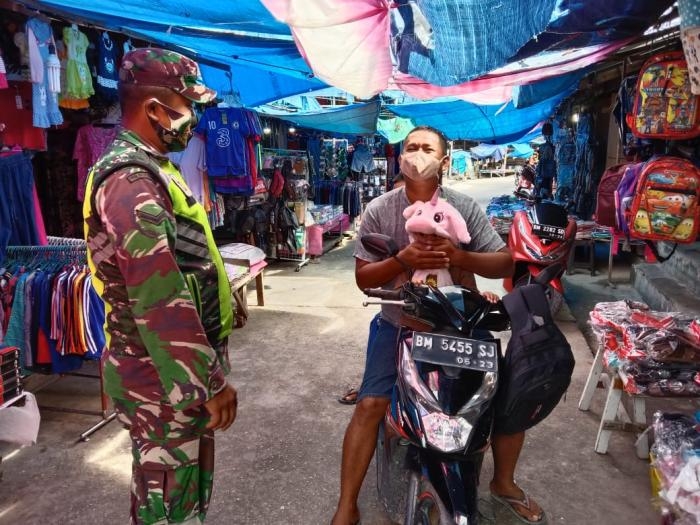 Anggota Danramil 09/Minas kembali terapkan Gakplin protokol kesehatan.