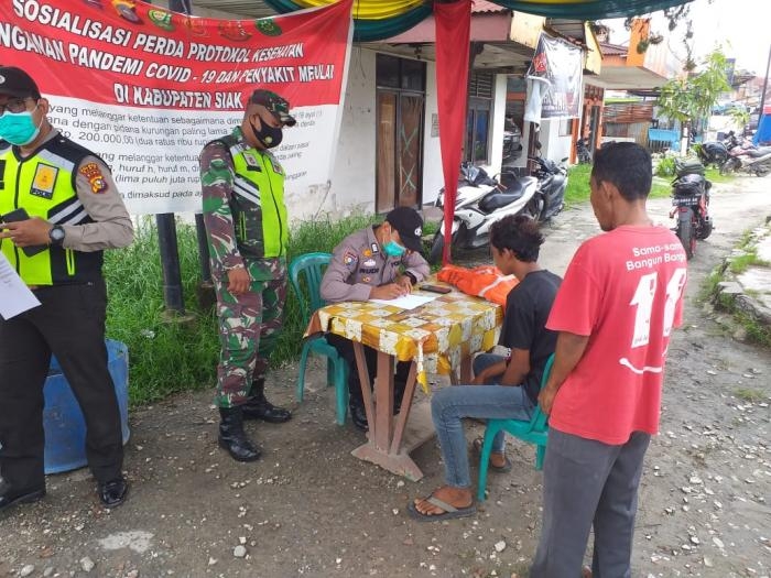 Anggota Koramil 09/Minas Kembali Mengelar Patroli Protokol Kesehatan