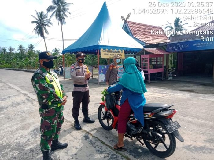 Anggota Danramil 01/Bengkalis Gelar Patroli Protokol Kesehatan