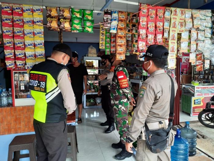 Cegah Covid 19, Babinsa Koramil 09 Minas Gelar Operasi Prokes