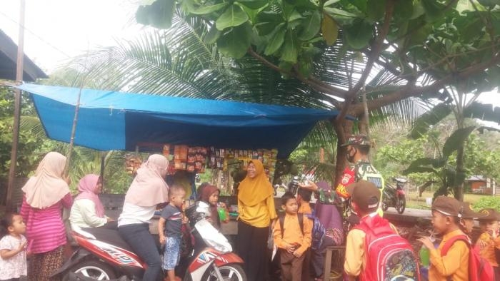 Anggota Koramil 08/Merbau Gelar Patroli Penegakan Disiplin Protokol Kesehatan