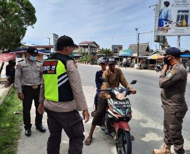 Anggota Koramil 09/Minas Kembali Mengelar Patroli Protokol Kesehatan