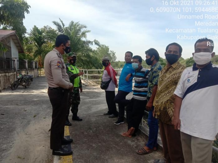 Antisipasi Covid 19, Sertu Uuk Sudarjianto Giat Lakukan Komunikasi Sosial di Kampung Maredan Tualang