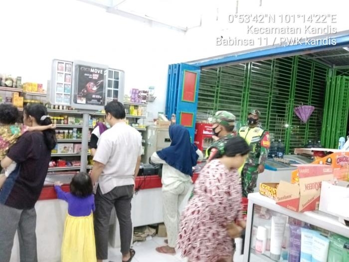 Cegah Covid 19, Personil TNI 11 Kandis Menggelar Operasi Bantuan Kemanusiaan