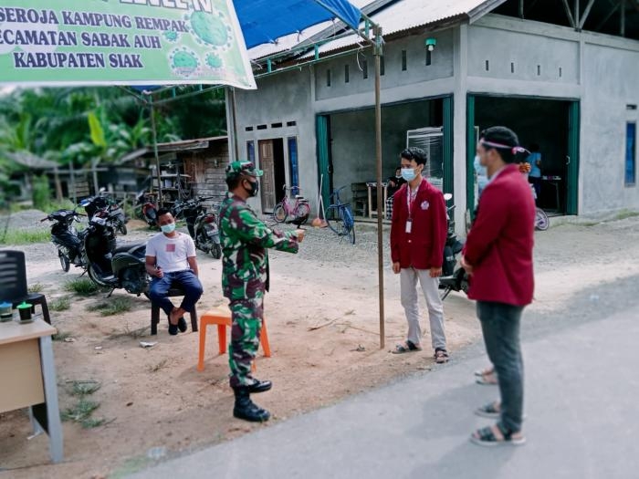 Antisipasi Covid 19, Personil Koramil 12 Sabak Auh Sertu Muhajirin Giat Lakukan Operasi Yustisi