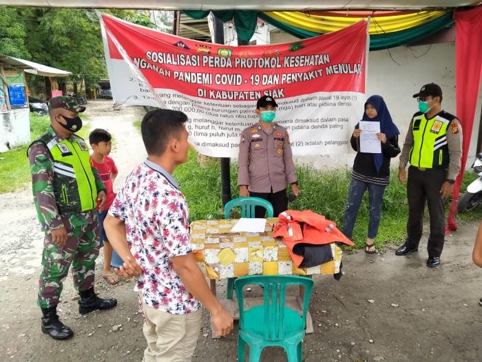 Anggota Danramil 09/Minas Gelar Patroli Gakplin Protokol Kesehatan.