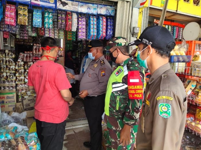 Kopda Andis Eko Terapkan Prokes dalam Kegiatan Operasi di Minas Jaya