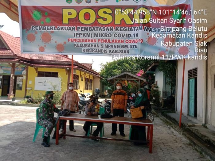 Babinsa Koramil 11 Kandis Gelar Operasi Prokes di Simpang Belutu