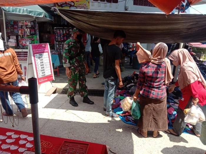 Putus Covid 19, Sertu Nuril Zafri Kembali Gelar Operasi Yustisi di Pasar Tradisional