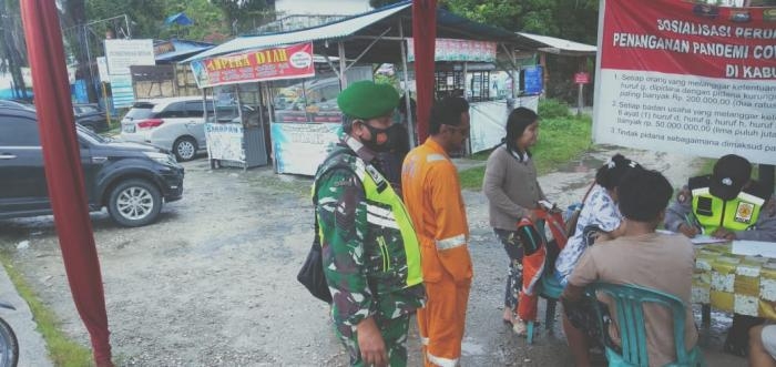 Putus Covid 19, Babinsa Kelurahan Minas Gelar Operasi Yustisi