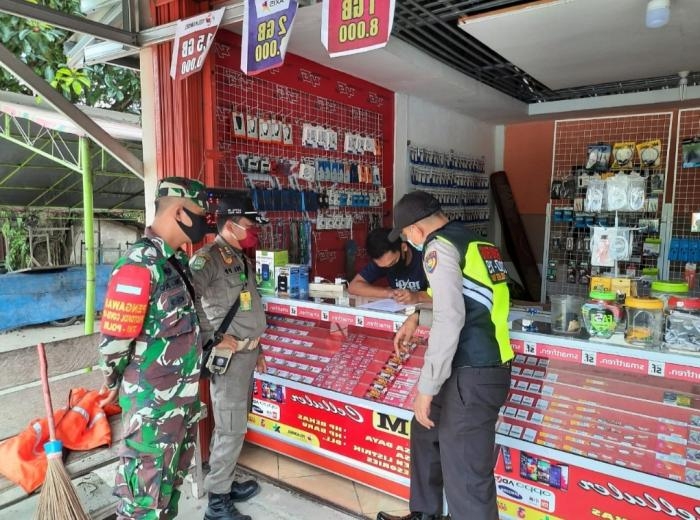 Antisipasi Penyebaran Covid 19, Anggota Koramil 09 Minas Gelar Operasi Penanganan Kesehatan