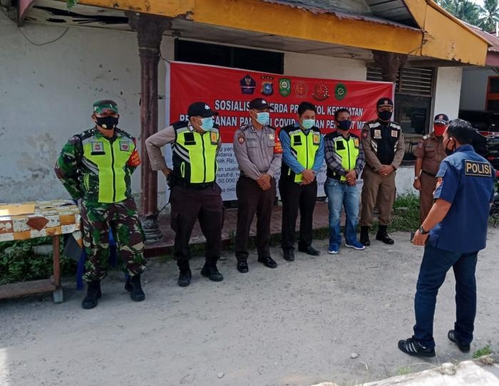 Putus Penyebaran Covid 19, Personil Koramil 09 Minas Bersama Tim Gabungan Gelar Operasi Yustisi