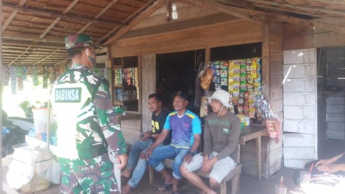 Anggota Danramil 08/Merbau Kembali Mengelar Sosialisasi Gakplin Protokol Kesehatan