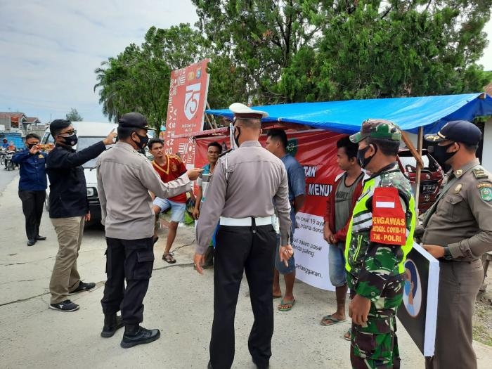 Cegah Covid 19, Personil Koramil 09 Minas Gelar Operasi Penegakan Disiplin