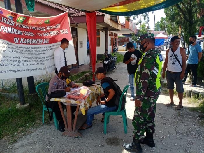 Anggota Danramil 09/Minas kembali terapkan Gakplin protokol kesehatan.