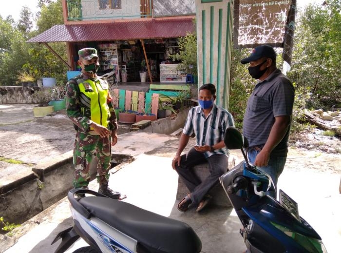 Babinsa Desa Bagan Melibur Kecamatan Merbau lakukan Sosialisasi Protokol Kesehatan