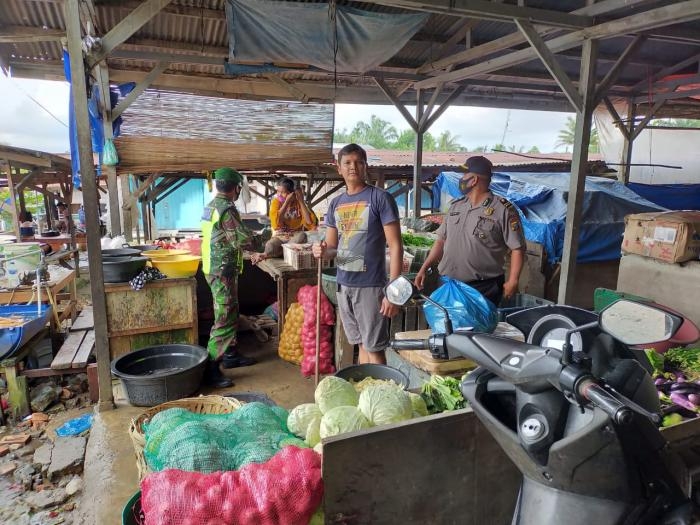 Anggota Danramil 09/Minas Kembali gelar gakplin protokol kesehatan.