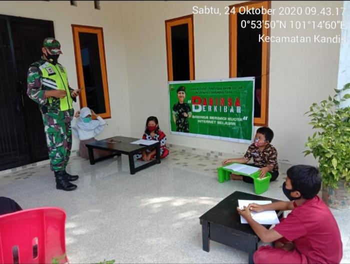 Babinsa Koramil 11/Pwk Kandis kembali gelar bakhti sosial di Dusun Sei Leko.
