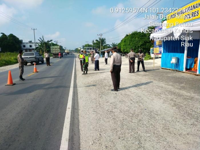 Cegah Penularan Covid 19, Anggota Koramil 11 Kandis Gelar Operasi Prokes Di Pos Penyekatan