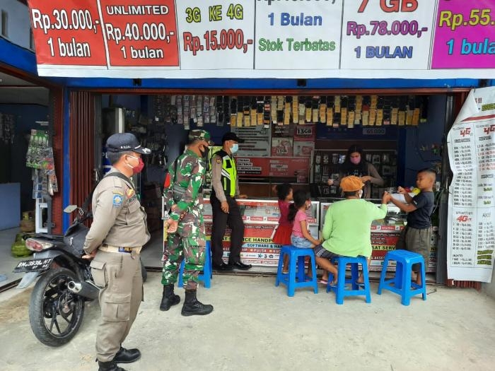 Anggota Koramil 09 Minas Gelar Operasi Yustisi Penanganan Covid -19