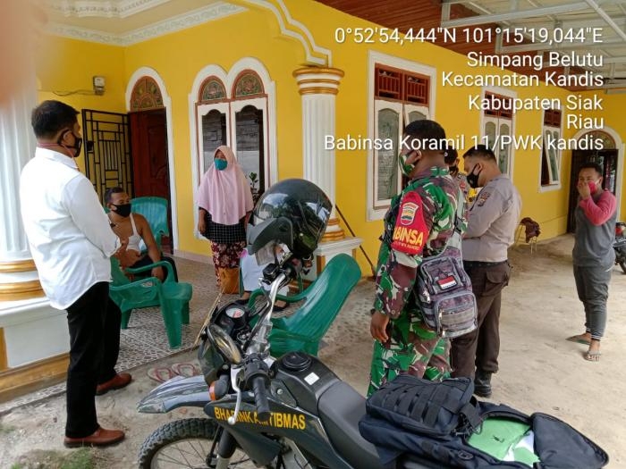 Cegah Penularan Covid 19, Babinsa Koramil 11 Kandis Gelar Tracing Kepada Warga Simpang Belutu