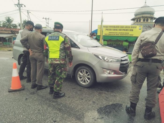 Cegah Covid 19, Anggota Koramil 12 Sabak Auh Gelar Sosialisasi