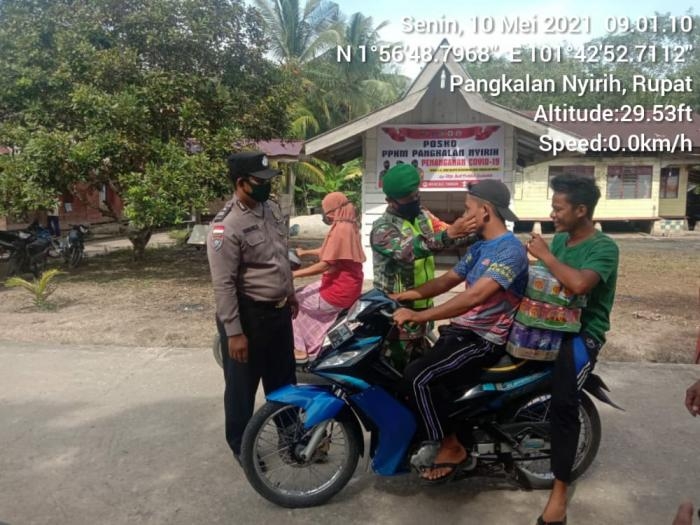 Antisipasi Penyebaran Covid 19, Babinsa Desa Pangkalan Nyirih Giat Lakukan Patroli Prokes