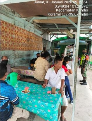 Anggota Danramil 11/Pwk Kandis Mengelar Pengamanan Natal dan Malam Tahun Baru 2021