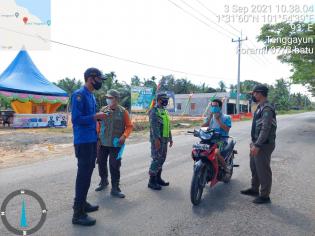 Putus Covid 19, Serda Ode K Bersama Tim Gabungan Giat Lakukan Patroli di Pos PPKM 